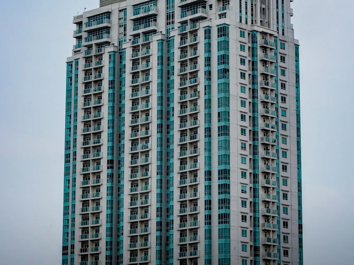Residential condominium tower at dusk