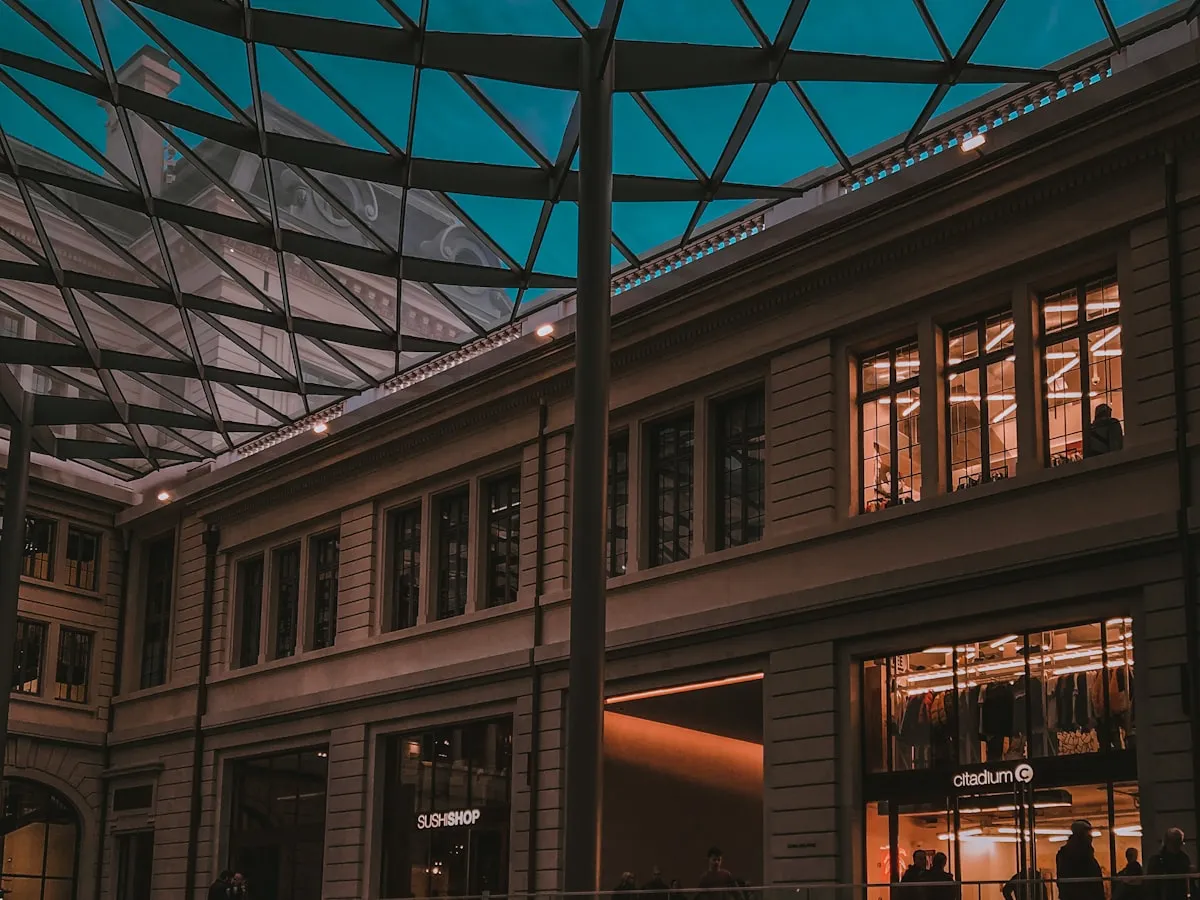 Lit retail parking area after closing time